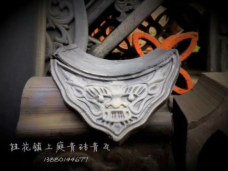 论瓦当滴水的多样